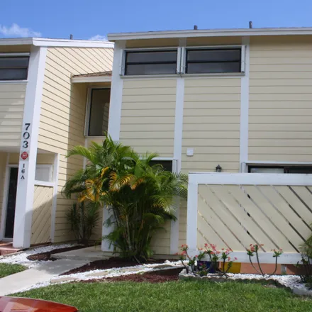 Rent this 2 bed townhouse on 703 Stonewood Court in West Jupiter, Jupiter