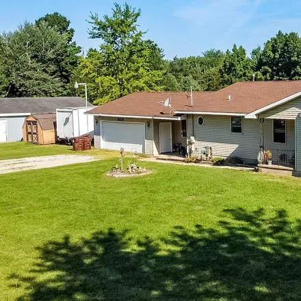 Buy this 5 bed house on 5529 Coan Street in Nelson Township, MI 49343