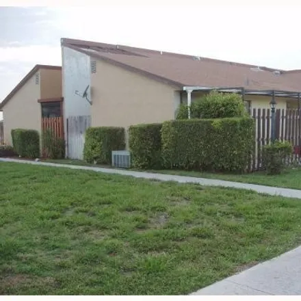 Buy this 3 bed townhouse on 4004 Waterview Circle in Palm Springs, FL 33461