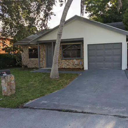Buy this 3 bed house on 23444 Country Club Drive East in Palm Beach County, FL 33428