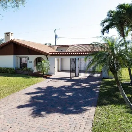 Buy this 3 bed house on 1898 Richard Lane in Palm Springs, FL 33406