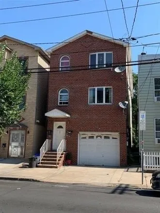 Buy this 8 bed house on 132 Zabriskie Street in Jersey City, NJ 07307