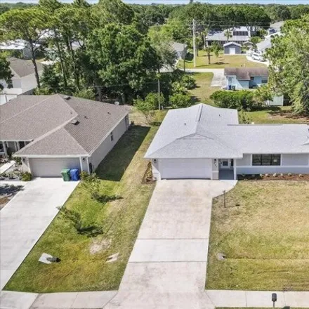 Buy this 4 bed house on 757 Periwinkle Drive in Sebastian, FL 32958