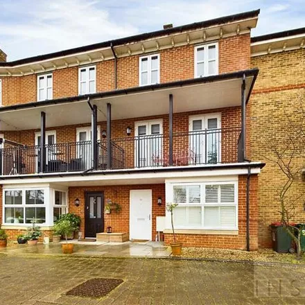 Buy this 4 bed townhouse on Stone Court in Pound Hill, RH10 7PQ