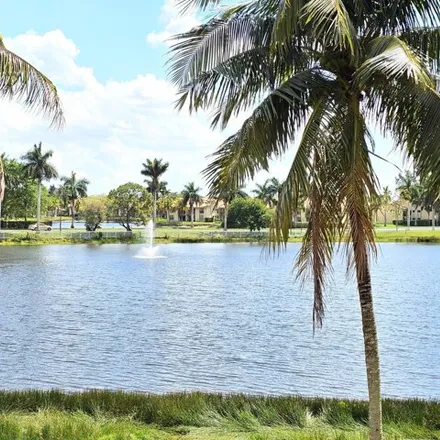Rent this 2 bed condo on 1648 Windorah Way in Golden Lakes, Palm Beach County