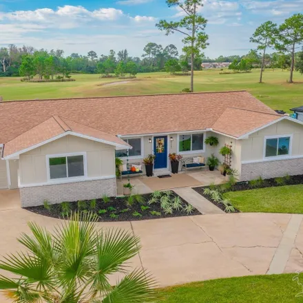 Buy this 4 bed house on 5129 Choctaw Avenue in Perdido Bay Country Club Estates, Escambia County