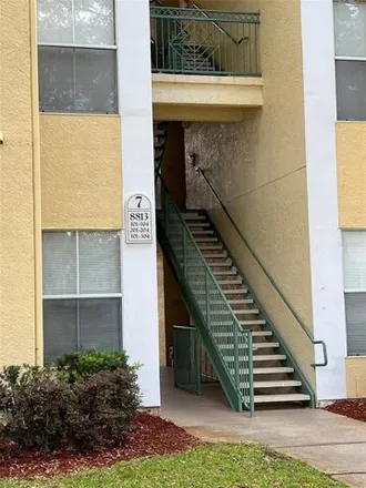Rent this 2 bed condo on 8837 Dunes Court in Four Corners, FL 34747