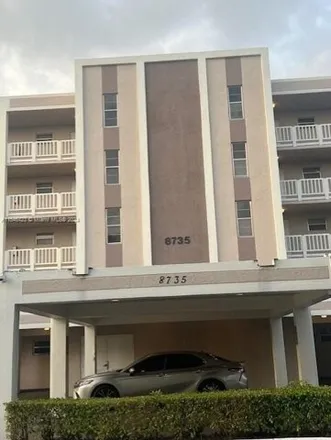 Rent this 2 bed condo on 1075 Riverside Drive in Coral Springs, FL 33065