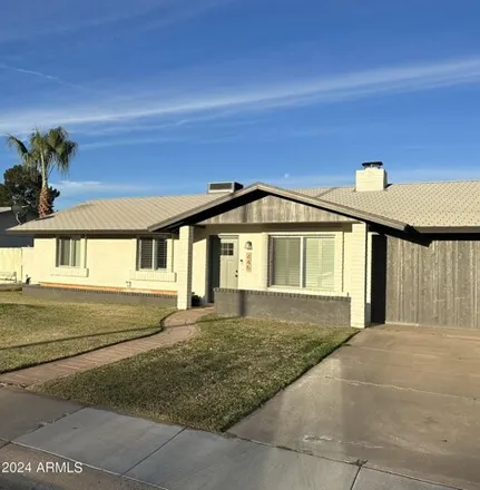 Rent this 4 bed house on 446 North Larkspur Street in Gilbert, AZ 85234