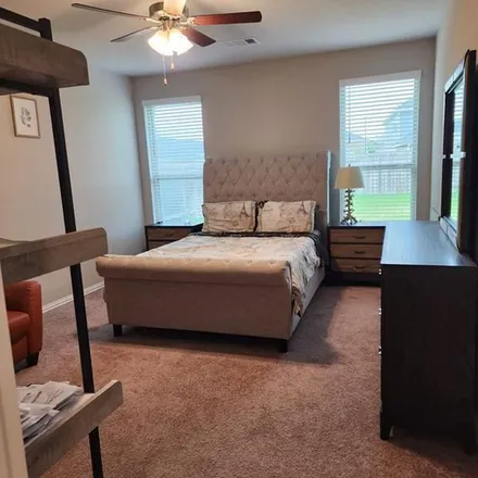 Rent this 4 bed apartment on Spotted Saddle Hollow in Fort Bend County, TX 77441