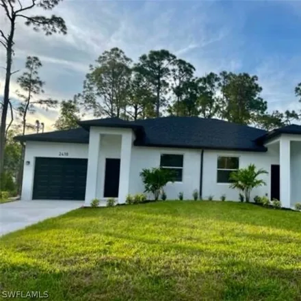 Rent this 3 bed house on 2440 Lantana Avenue in Stoneybrook, Lehigh Acres