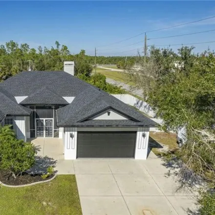 Buy this 3 bed house on 23526 Chimes Ave in Port Charlotte, Florida