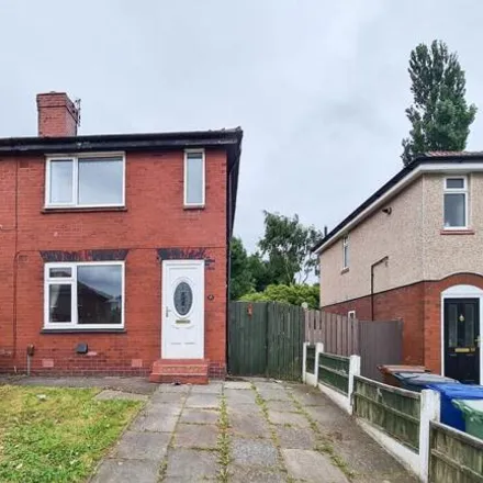 Rent this 3 bed duplex on Acacia Crescent in Wigan, WN6 8NJ