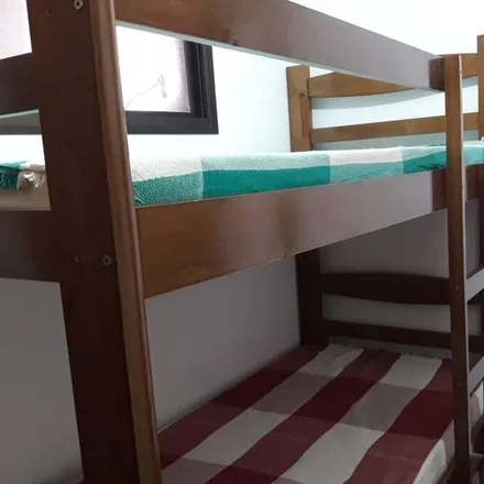 Rent this 3 bed apartment on Guarujá in Região Metropolitana da Baixada Santista, Brazil