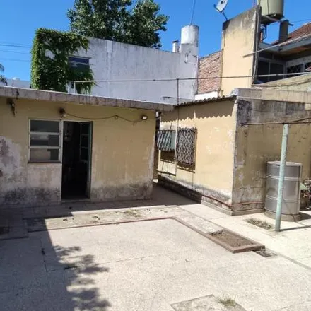 Buy this 4 bed house on Santander 1511 in Partido de La Matanza, B1704 FLD Ramos Mejía