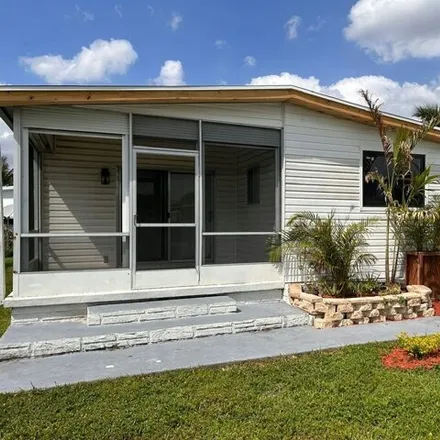 Buy this studio apartment on Clubhouse Drive in Pine Island, FL 33325