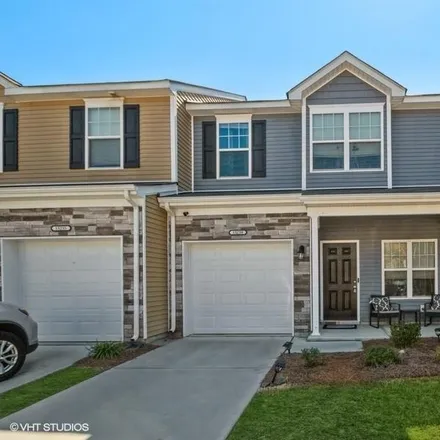 Buy this 2 bed townhouse on 15239 Wrights Crossing Drive in Charlotte, NC 28278