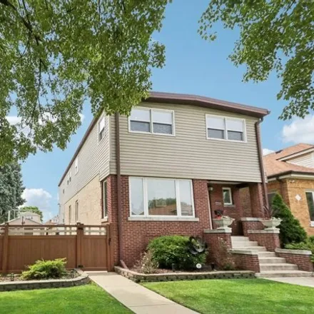 Buy this 4 bed house on 6307 W Berenice Ave in Chicago, Illinois