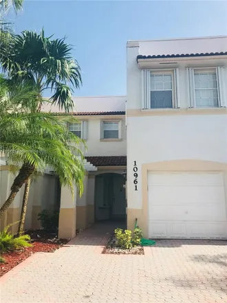 Rent this 3 bed apartment on 10961 Northwest 65th Street in Doral, FL 33178