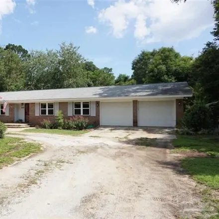 Rent this 3 bed house on 1027 East Burgess Road in Pensacola, FL 32504