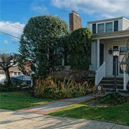 Buy this 6 bed house on 1433 E Street in Elmont, NY 11003