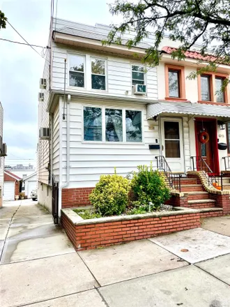 Buy this 3 bed house on 60-49 59th Drive in New York, NY 11378