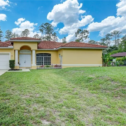 Buy this 3 bed house on 1311 Roosevelt Avenue in Lehigh Acres, FL 33972