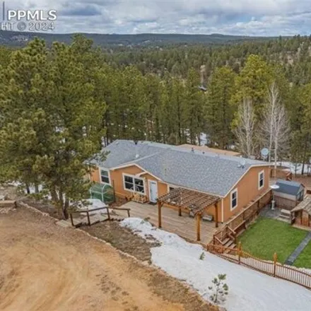 Buy this studio apartment on 519 Badger Trail in Teller County, CO 80816