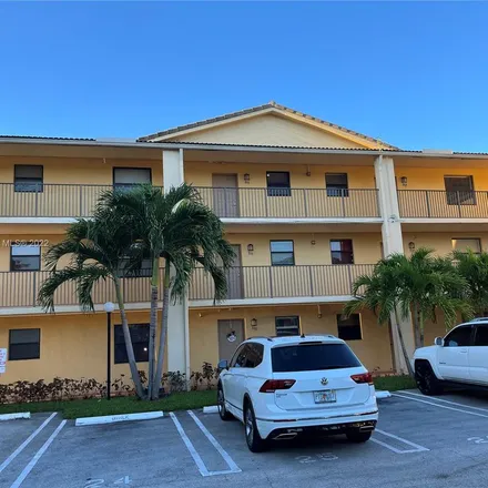 Rent this 2 bed apartment on 11469 Northwest 39th Court in Coral Springs, FL 33065