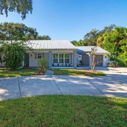 Rent this 3 bed house on 824 Flamevine Lane in Vero Beach, FL 32963