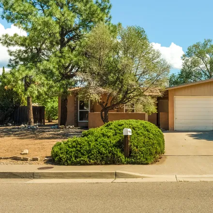 Buy this 4 bed house on 4720 Overland Street Northeast in Albuquerque, NM 87109