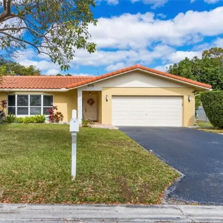 Buy this 4 bed house on 8735 Nw 29th Dr in Coral Springs, Florida