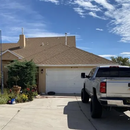 Buy this 4 bed house on 1508 Golf Course Road Southeast in Rio Rancho, NM 87124
