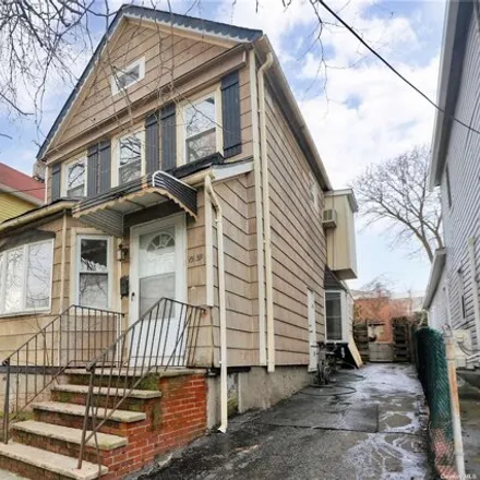 Buy this 3 bed house on 15-59 150th Place in New York, NY 11357