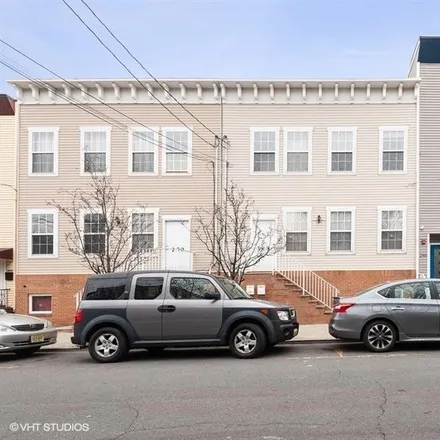 Buy this 3 bed townhouse on 245 Pine Street in Communipaw, Jersey City