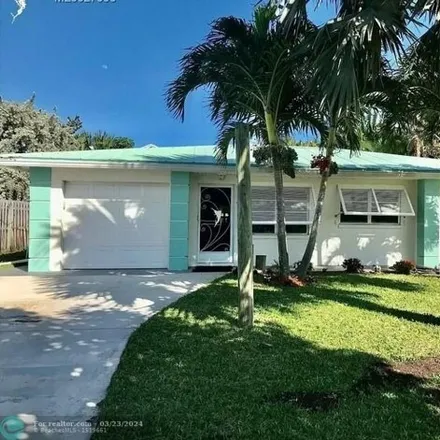 Rent this 3 bed house on 310 Granada Street in Fort Pierce, FL 34949