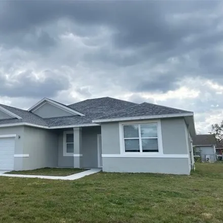 Buy this 4 bed house on 624 Parakeet Court in Polk County, FL 34759