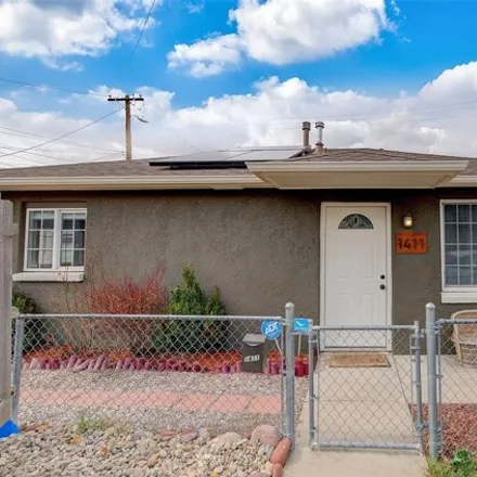 Buy this 2 bed house on 9861 East 14th Avenue in Aurora, CO 80010