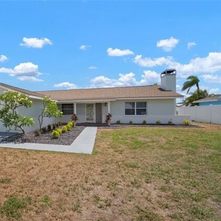 Buy this 3 bed house on 910 Spindle Palm Way in Apollo Beach, Florida