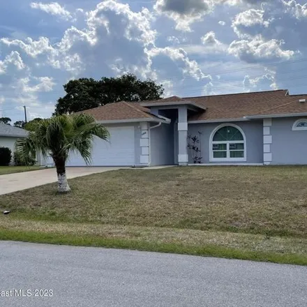 Buy this 3 bed house on 1310 Giralda Circle Northwest in Palm Bay, FL 32907