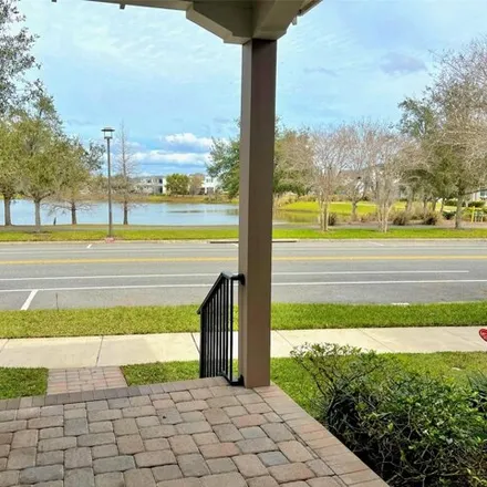 Image 2 - 9120 Tavistock Lakes Boulevard, Orlando, FL 32827, USA - House for rent