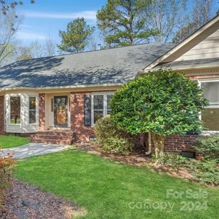 Buy this 4 bed house on 14905 Wyndham Oaks Drive in Charlotte, NC 28277