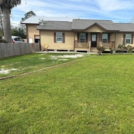 Rent this 4 bed house on 7029 Williams Road in Baytown, TX 77523