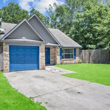 Buy this 3 bed house on 1199 Byrdsong Court in Conroe, TX 77301