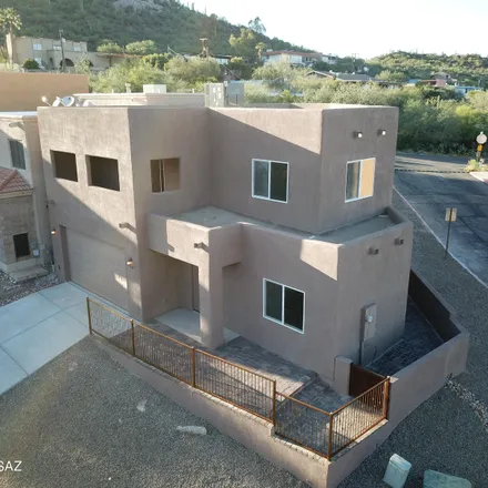 Buy this 4 bed house on 1430 West Kandy Court in Tucson, AZ 85745