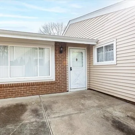 Buy this 2 bed condo on 215 E Springmeadow Drive in Holbrook, Islip