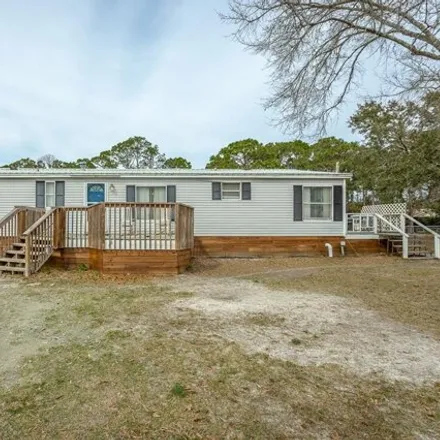 Buy this studio apartment on 98 Brian Street in Franklin County, FL 32328