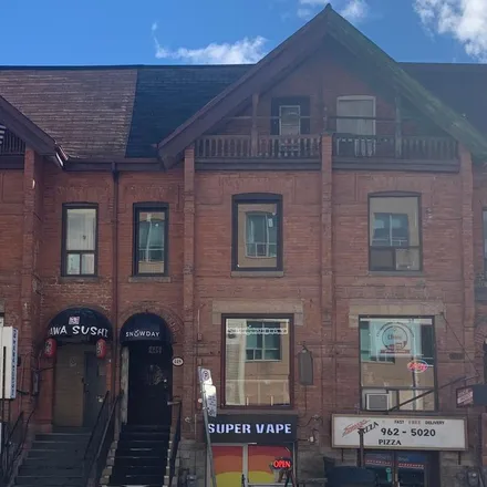 Rent this 3 bed apartment on Maple Leaf Convenience Mart in Alexander Street, Old Toronto