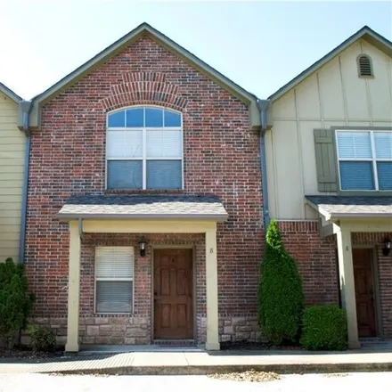 Rent this 2 bed townhouse on 2009 Karrington Circle in Gulley, Springdale