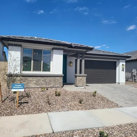 Rent this 3 bed house on West Macaw Court in Pinal County, AZ 84240